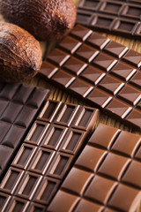 Bars Chocolate , candy sweet, dessert food on wooden background