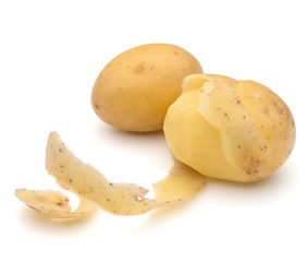 peeled potato tuber with peel spiral isolated on white backgroun