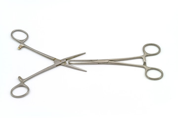 Surgical instrument (hemostat or artery clamp ) on white background