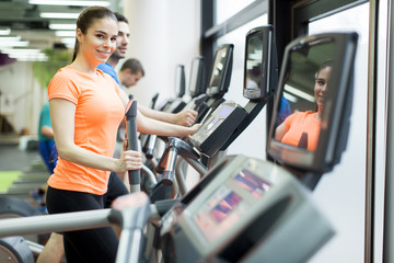 Fototapeta premium Young woman in the gym