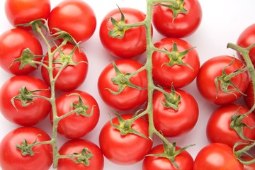 Fresh tomatoes on white background