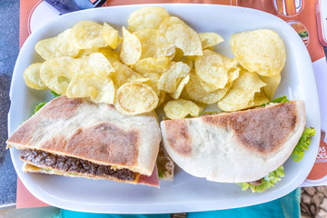 Plate with Bread Meat and chips