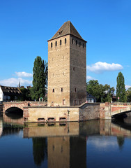 Fototapeta na wymiar Old bridge with tower - Strasbourg - France