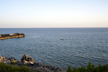 A boat along the coast