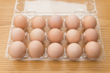top view fresh eggs in a plastic package