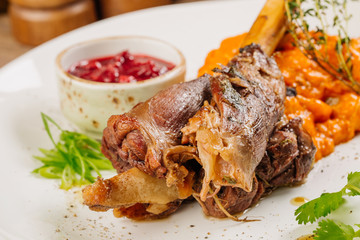 Lamb shank with roasted vegetables puree