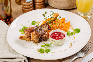 Lamb shank with roasted vegetables puree