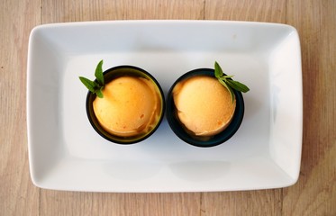 Scoop of peach and lemon verbena sorbet