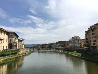 view of the riverside in Florence, italia, from the Ponte Vecchio 