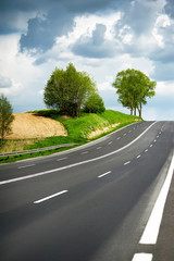 highway asfalt road and beautiful  cloudy sky