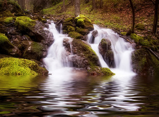 beautiful waterfall in the deep forest. natural background. 