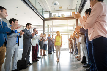 smile employer applauding to confident leader.