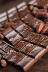 Bars Chocolate , candy sweet, dessert food on wooden background
