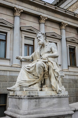 Fototapeta na wymiar Greek, Roman historians on Austrian Parliament. Vienna, Austria.