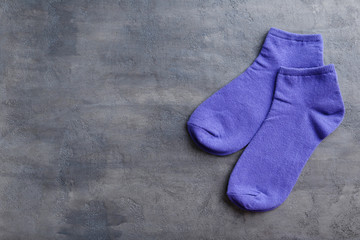 Blue socks on a grey table
