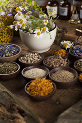 Natural medicine on wooden table background