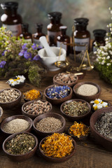 Herbal medicine on wooden desk background