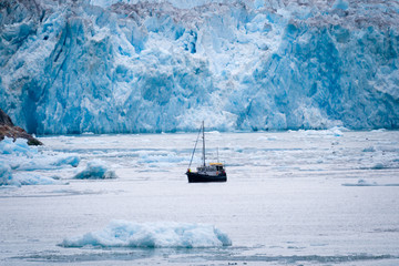Small boat by Glacier