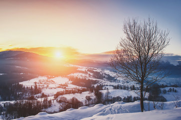 beautiful winter landscape. Sunrise (sunset) in mountain.
