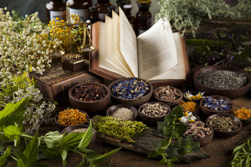 Herbal medicine on wooden desk background