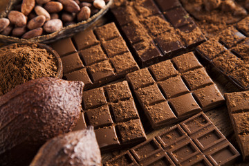 Bars Chocolate , candy sweet, dessert food on wooden background