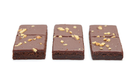 Chocolate Brownies with Nuts on Top on a White Background