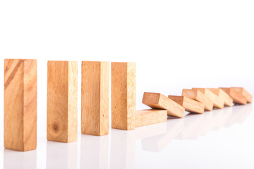 Row of wooden block tower game children isolated on white