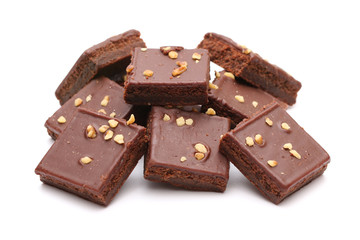 Chocolate Brownies with Nuts on Top on a White Background