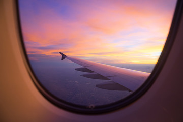 Fototapeta na wymiar Sunset sky from the airplane window