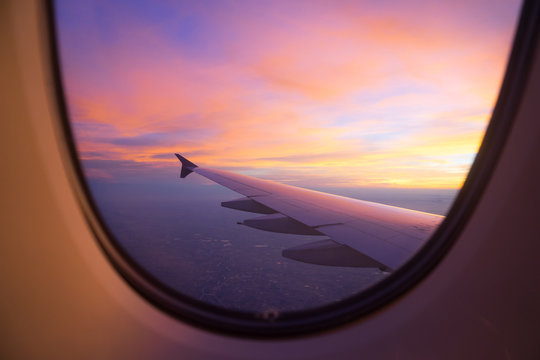 pretty sunset sky with plane