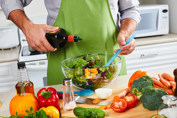 Chef man cooking in the kitchen.