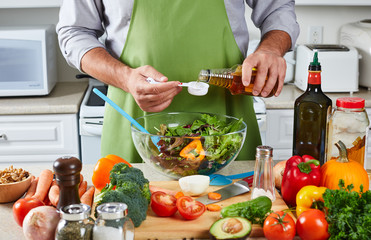 Chef man cooking in the kitchen.