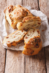 Italian homemade bread filled with cheese and bacon and dried tomatoes. vertical
