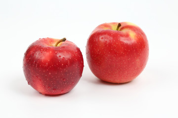 Fototapeta na wymiar two red apple on white background