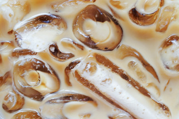 macro of ice coffee latte, top view