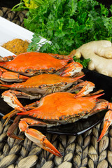 Steamed crabs with spices. Maryland blue crabs. Hot steamed blue crabs with ginger. Crab festival.