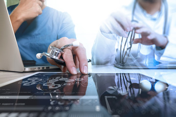 Medical technology network team concept. Doctor hand working wit