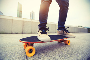 skateboarder skateboarding at city