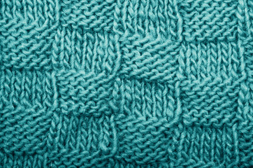 Detail of woven handicraft knit woolen design texture.