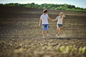 Romantic couple on field