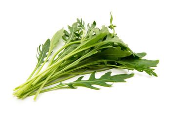 Fresh arugula leaves. Isolated on white background.