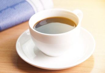 Black coffee on office table background