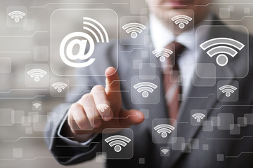 Social network Wifi businessman presses button mail network email signal