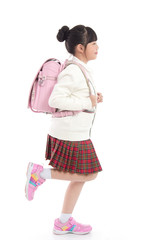 Asian child in school uniform with pink school bag