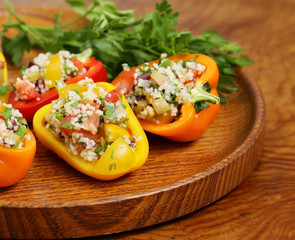 appetizer salad of peppers stuffed with cous cous - obrazy, fototapety, plakaty
