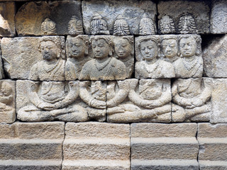 The 9th-century stone carving at BorobudurTemple, telling the history of Buddhism, in Magelang Regency, near Yogyakarta, Indonesia