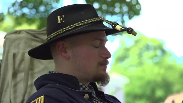 Civil War soldier wearing regimental hat