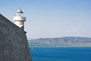 Fototapeta na wymiar Lighthouse of Porto Ercole, Tuscany in Italy
