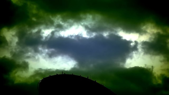 Dramatic sky with stormy clouds and lightnings