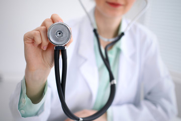 Doctor with a stethoscope in the hands